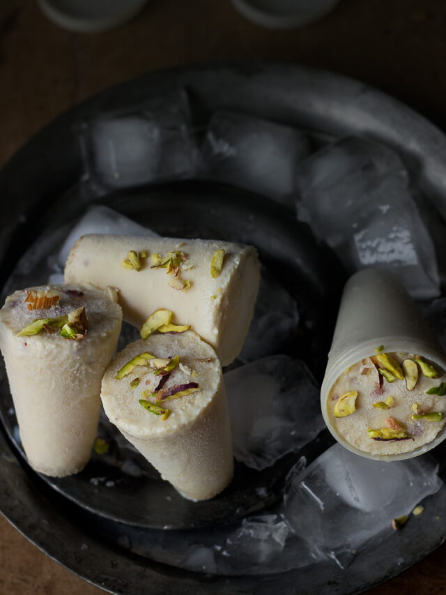 Creamy Homemade Malai Kulfi garnished with crushed pistachios