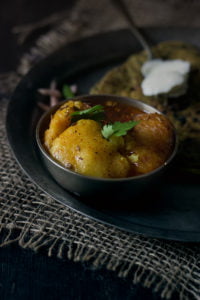 Close-up of Tazi Mangodi Ki Sabji garnished with coriander leaves