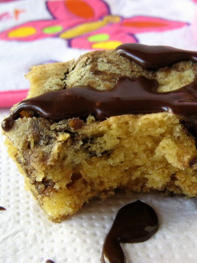 Eggless chocolate marble cake sliced on a serving plate