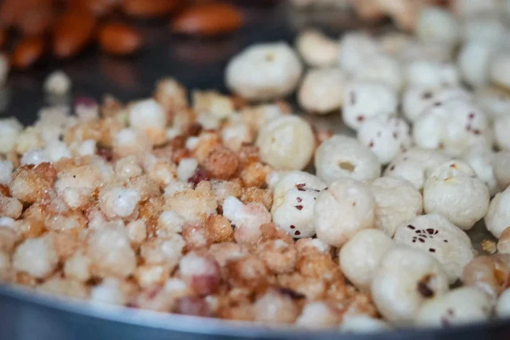 Ingredients for gond panjiri including gond, nuts, coconut and ghee