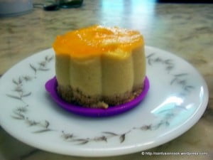 No-bake mango cheesecake topped with fresh mango jam