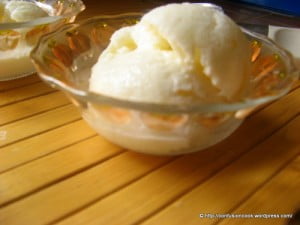 A creamy scoop of tender coconut ice cream served in a bowl