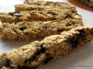 A plate filled with eggless cappuccino biscotti slices, perfect for dipping in a hot cappuccino