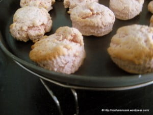 Close-up of a strawberry scone showing flaky layers