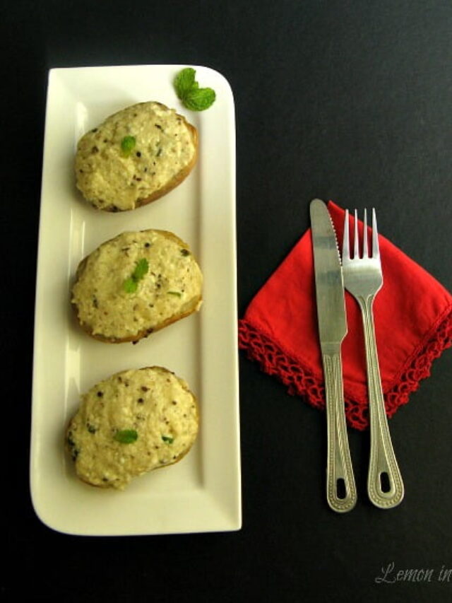 Freshly baked, golden brown twice-baked potatoes on a plate