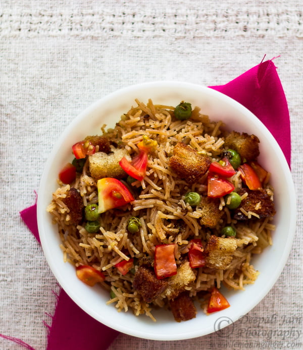 Close-up of Vermicelli Upma showing mixed vegetables and spices