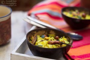 Home-made Chiwda topped with roasted peanuts, cocunut & chilies