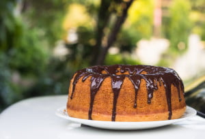 Close-up of the smooth, golden crust of a freshly baked Vanilla Bundt Cake