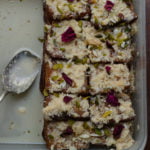 A plate of Authentic Shahi Tukda garnished with chopped pistachios and almonds