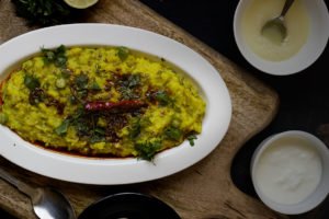 Bajre Ki Khichdi with a bowl of desi ghee and yoghurt