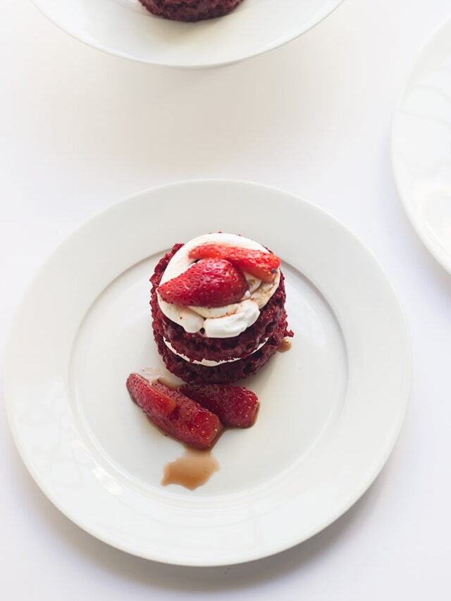 Close-up of a freshly baked eggless red velvet mini cake with cream cheese frosting