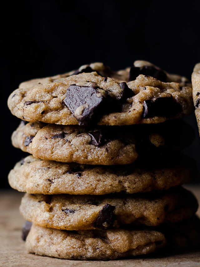 A close-up of rich, dark chocolate chunks embedded in a cookie