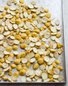 Close-up of Moong Dal Vadi showing the texture and color of the sun-dried pieces