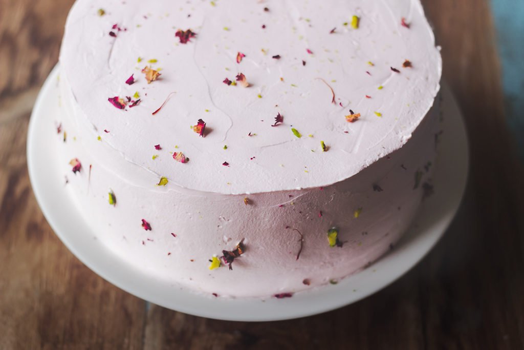 Homemade rose cake topped with dried rose petals