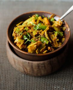 Fresh coriander leaves sprinkled on top of Gawar Phali Ki Sabji for garnish