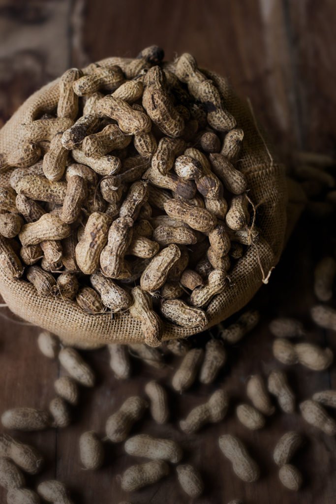 Raw peanuts kept in a jute sack