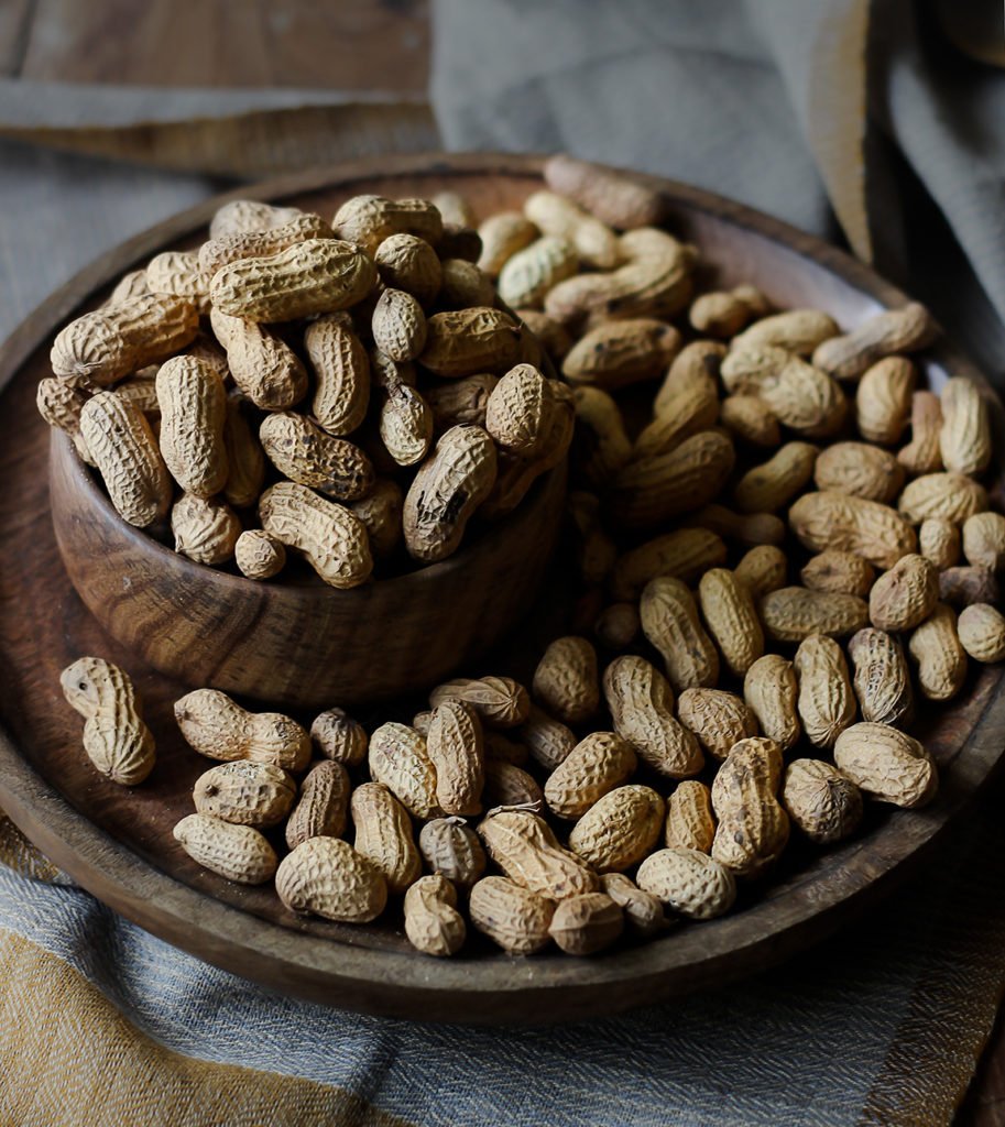 Roasted peanuts in bowl and a plate