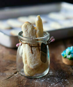 Freshly baked Eggless Lady Fingers in a jar