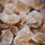 Fresh homemade amla candy with a glossy sweet coating.