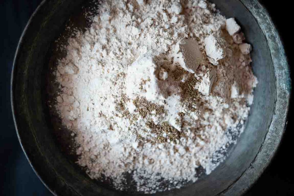 Poori dough with carom seeds on the top