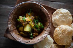 Singre mogri sabzi prepared with potatoes and uradi wadi